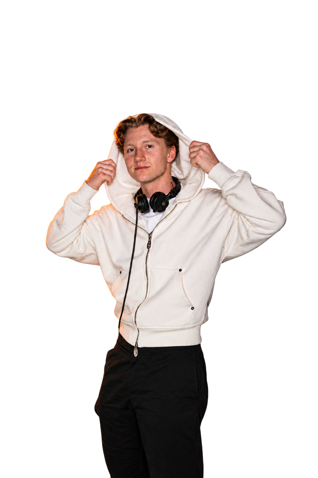 Spryze with headphones and a white hoodie